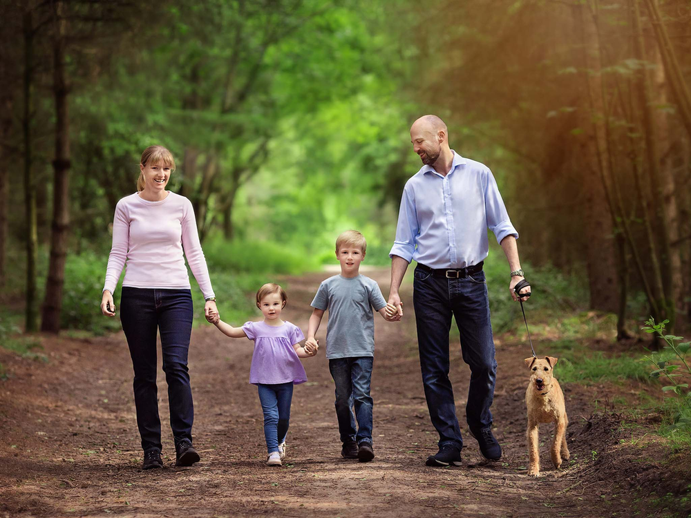 Mum, Dad, kids and dog enjoying their outdoor photography session with Fairy Nuff Photography, Nottingham