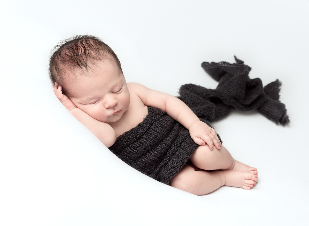 newborn photography side pose with wrap