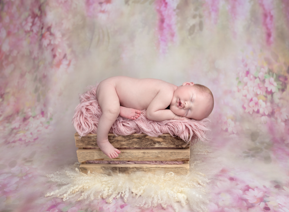 Baby posed on a prop