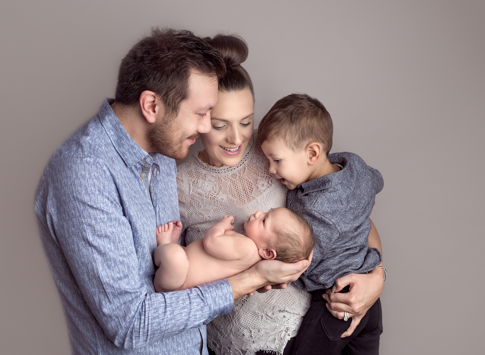 Family image with a newborn baby