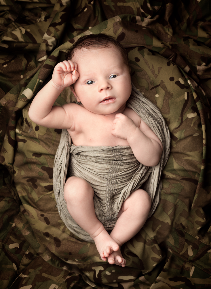 Baby celebrating his Father's military service to his country - military themed Baby Photoshoot at Fairy Nuff Photography Nottingham